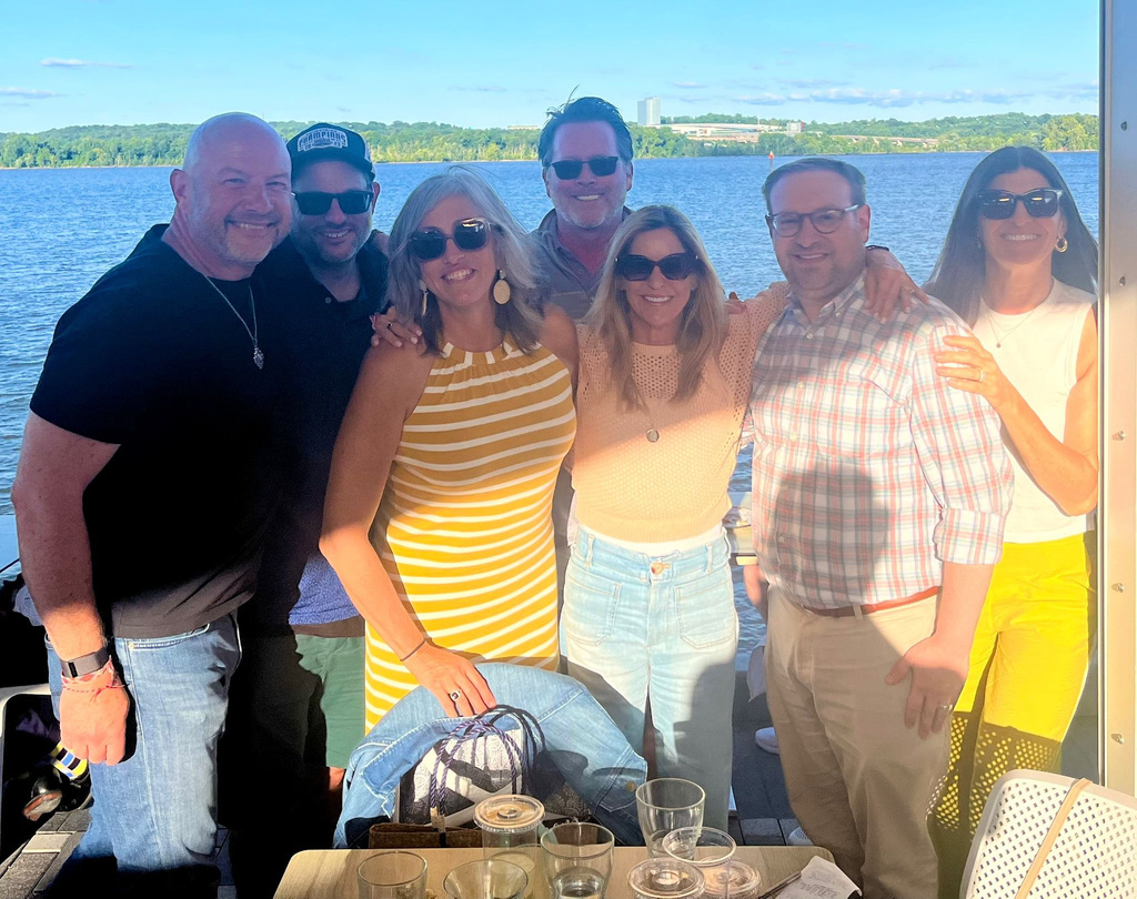 EO members gathered together at the waterfront